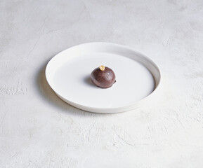 A plate filled with assorted cake and pastry pieces, photographed to highlight texture, color, and appetizing detail.