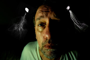 Troubled adult male facing ghostlike entities and deep psychological distress