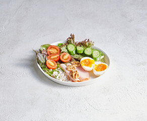 Freshly prepared breakfast plate with eggs served on a clean surface, highlighting color, texture, and appetizing presentation.