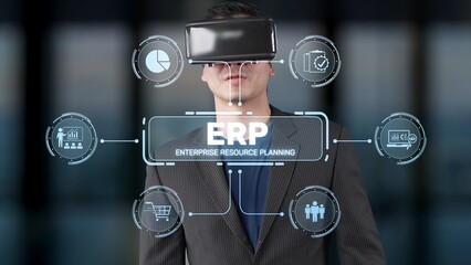 A businessman engages with virtual reality technology to explore enterprise resource planning concepts, visualizing crucial business data in a modern office setting. Raster