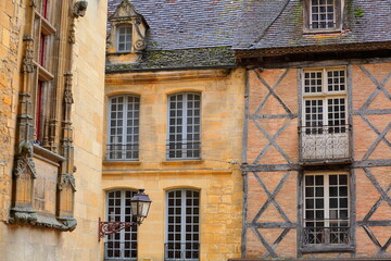 Medieval historical buildings in the city center of  Sarlat La Caneda, Dordogne, France, with half-timbered facades