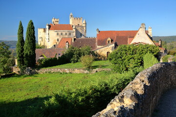 The impressive and well preserved medieval castle of  Beynac et Cazenac, Dordogne, France, viewed...