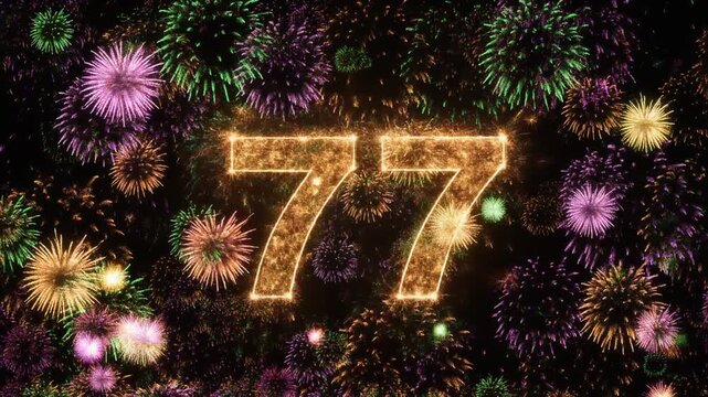 Number 77 surrounded by fireworks. Festive video for birthday or anniversary party