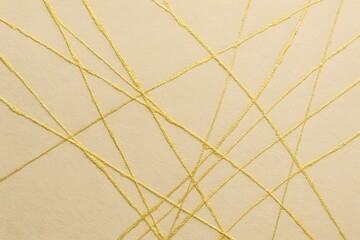 Goldene erhabene Linien auf hellem Grund © lavillia