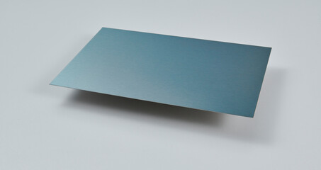 Close up image of metallic surface sheets with brushed and matte finishes, showcasing industrial texture and modern material design for architecture, manufacturing, and product design applications.