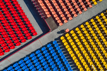 Aerial view of vibrant, empty seats creating a colorful geometric pattern, showcasing the stadium's architecture, Sarajevo, Federation of Bosnia and Herzegovina, Bosnia and Herzegovina.