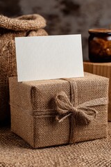Rustic Gift Box with Blank Card, Natural Burlap Texture, Warm Lighting, Mockup.