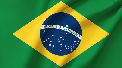 Fototapeta premium A high-resolution photograph of the Brazilian flag waving in a bright blue sky with white clouds.