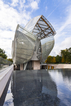 Paris, France, October 21, 2025 - Vertical view of the exterior of the&nbsp;2014 Louis Vuitton Foundation art museum and cultural center by architect Frank Gehry seen in the fall