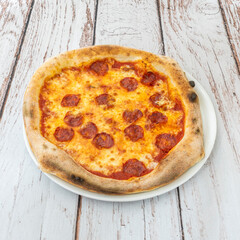 Italian Sausage Pizza with crumbled homemade sausage, roasted peppers, and evenly melted provolone cheese