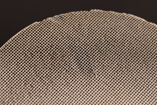 parts of an old ceramic catalyst made of modern ceramic materials, ceramic catalyst with a large number of holes for cleaning emissions after prolonged operation