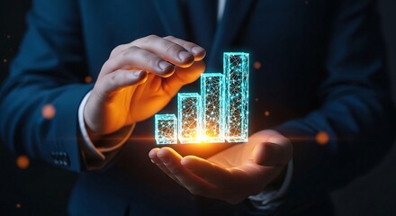 Businessman holding glowing bar chart representing business growth and financial success.