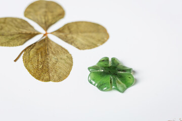 Detail of four-leaf clover on background