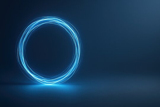 Abstract glowing light circle made of blue lines on dark gradient background with wide copy space futuristic concept of technology innovation and energy