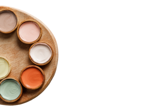 Clay skincare assortment in wooden bowls