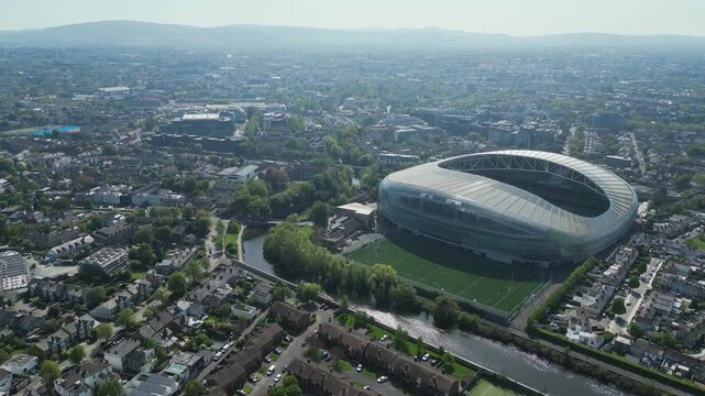 Dolly aerial view approaching Aviva Stadium and Meta Headquarters, Dublin, Ireland