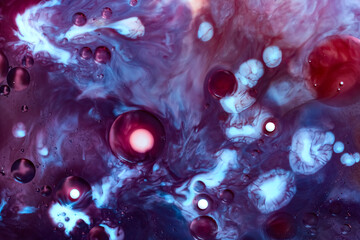 Futuristic macro of colorful fluids, white and red bubbles in purple and blue swirls. Cosmic science-inspired abstract, perfect for fantasy, space, and creative visual design