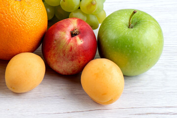 Bright Assortment of Fresh Fruits on White Wood Tabletop