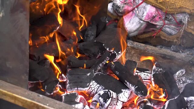 slow motion shot of Traditional bar b q of mutton at charsi tikka shop, Peshawar, Pakistan