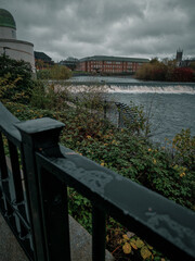 Moody Rainy Day View of Historic Architecture and River Weir in Derby City Centre, UK