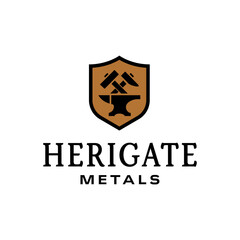 Strong blacksmith emblem featuring crossed hammers and an anvil inside a shield, ideal for metalwork, craftsmanship, forging, and industrial branding. Editable Vector File
