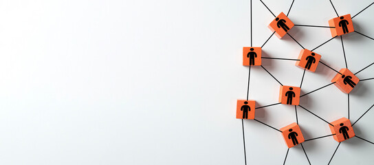 Business network and human resources concept.Orange wooden blocks with person icons connected by lines,symbolizing teamwork, social connection,organization structure on a white background,copyspace.