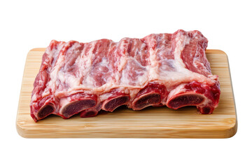 Obraz premium Fresh raw meat ribs displayed on a wooden cutting board. the marbling and texture. with a clean kitchen background emphasizing a culinary preparation scene