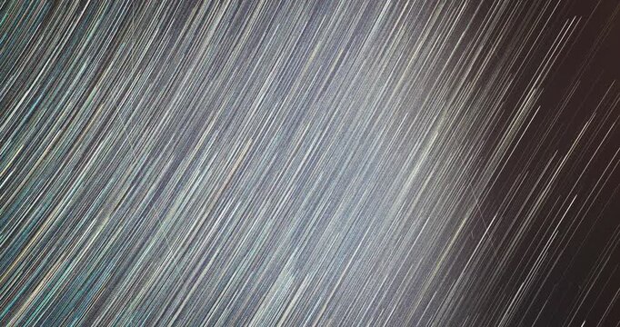 From Dusk Till Dawn Time Lapse. Spin Of Unusual Amazing Stars Effect In Sky. Night Starry Sky Transition To Morning Sky. Meteors Trace On Night Dark Sky Background. Soft Colors Bewitching Illusion
