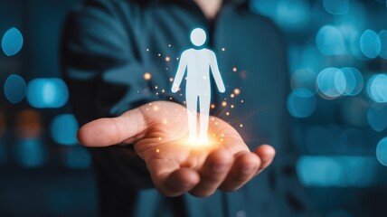 Human resource management concept visualized through a glowing silhouette held in an open palm