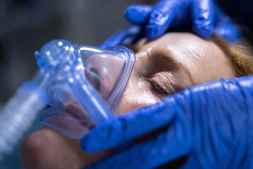 Emergency patient receiving oxygen support during critical care