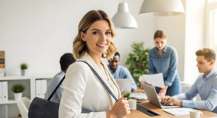 Professional business meeting with diverse team of colleagues collaborating in modern office environment with laptops and documents for teamwork and corporate success