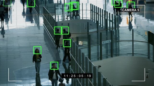 Video monitoring system performs biometric facial recognition of people in a public place. AI-controlled CCTV camera identifies and recognizes people. The interface of the surveillance application, 4k