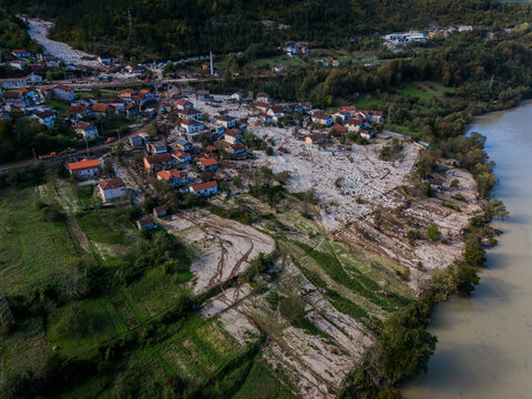 Aerial view of mudslide devastation consumes homes and fields near the river, a somber tableau of destruction, Jablanica, Federation of Bosnia and Herzegovina, Bosnia and Herzegovina.