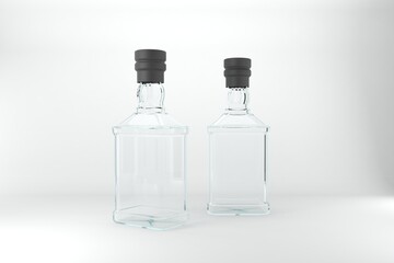 Elegant clear glass bottles with black caps awaiting your spirit brand design ideas for beverage packaging projects