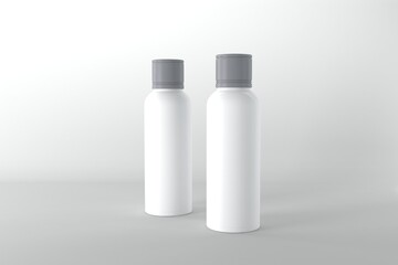 Minimalist white product bottles with gray caps for cosmetic branding and design mockups