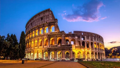 Plexiglas schilderij Rome Illuminated Colosseum at Twilight in Rome Italy Ancient Stone Architecture Historical Landmark with Dramatic Sky and Warm Golden Light against Dark Blue Sky  © elita