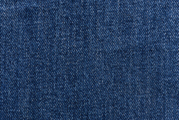Naklejka premium Washed denim fabric texture background