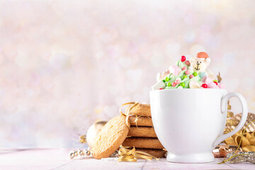 Festive tasty Christmas hot chocolate with holiday decorations