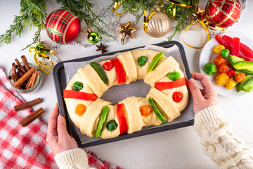 Cooking making traditional Christmas Mexican Rosca de Reyes