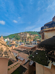 Bundi street life narrow lanes, blue houses, local vendors, and slow-paced rhythms of heritage India.