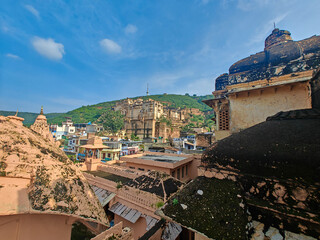 Bundi street life narrow lanes, blue houses, local vendors, and slow-paced rhythms of heritage India.