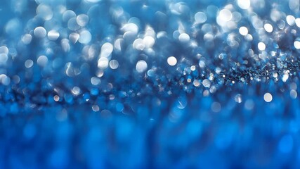 Abstract blue bokeh background with sparkling light orbs and soft gradient glow, a versatile, cinematic texture suitable for design projects, branding, events, and digital artwork