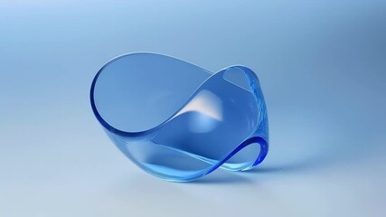 Elegant blue abstract glass sculpture resting on a gradient blue studio backdrop, highlighting smooth curves, translucent edges, reflections, and the tranquil modern art inspired form - Powered by Adobe