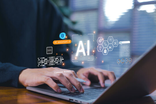 Hands typing on a laptop with a glowing AI interface and digital data graphics, representing artificial intelligence technology, and modern data-driven innovation in the workplace.