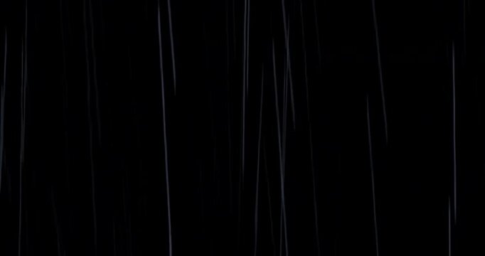 A powerful rainstorm crashes down in front of the camera, splashing sharply against a black backdrop. High-detail, practical, loopable VFX rain element for cinematic weather enhancement.