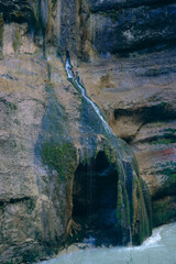 Waterfall in gorge: majesty of nature