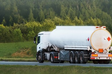 Highway scene with fuel delivery truck