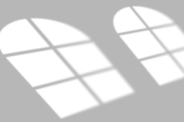 Soft window light patterns create a serene and tranquil atmosphere for creative backgrounds and design.