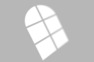 Soft window light overlay effect casting geometric shadows on a clean gray background