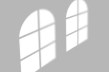 Soft window light shadows cast on minimalist wall creating serene ambiance for design overlays and backdrops